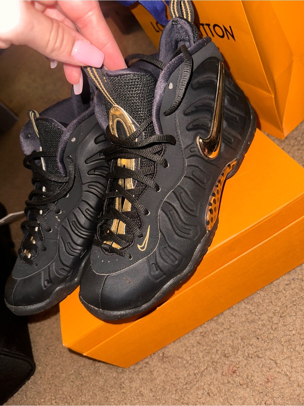 Nike Black Foamposite with Metallic Gold Swoosh